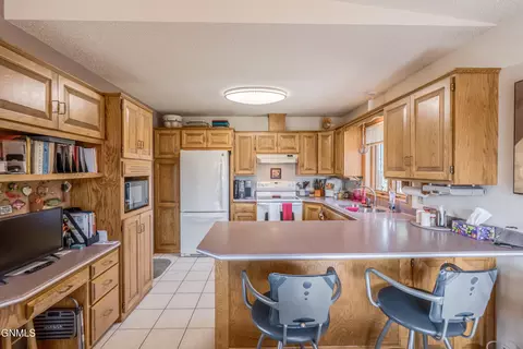 Kitchen - 410 3rd St, Riverdale, ND 58565 photo 1 of 6