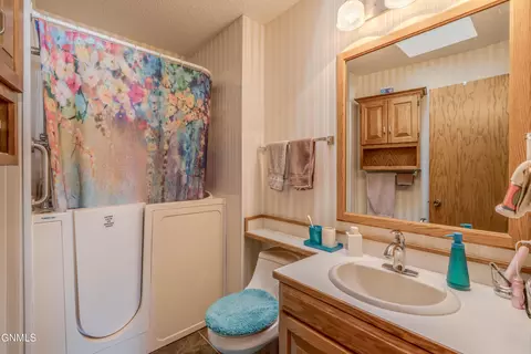 Bath - 410 3rd St, Riverdale, ND 58565 photo 1 of 8