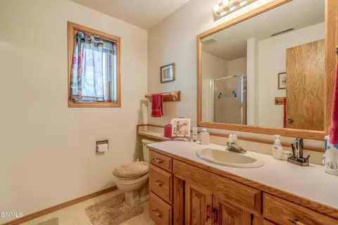 Bath - 410 3rd St, Riverdale, ND 58565 photo 6 of 8