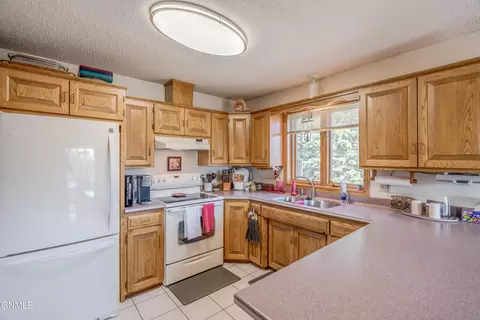 Kitchen - 410 3rd St, Riverdale, ND 58565 photo 3 of 6
