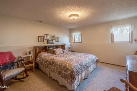 Bedroom - 410 3rd St, Riverdale, ND 58565 photo 5 of 7