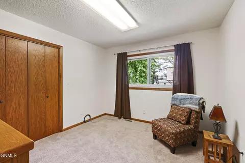 Bedroom - 13011305 4th Ave E, Williston, ND 58801 photo 5 of 6
