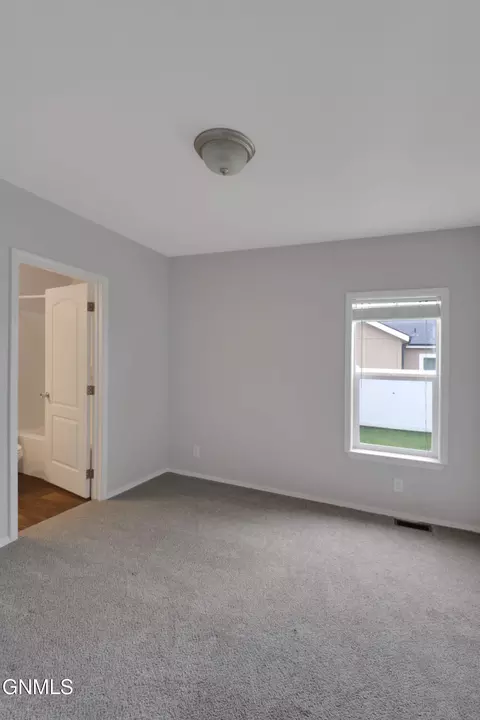 Bedroom - 622 40th St E, Williston, ND 58801 photo 3 of 5
