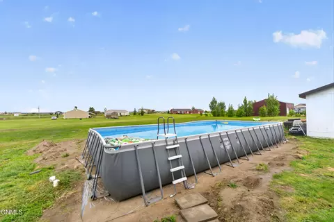 Exterior - 5727 Freedom Ln, Williston, ND 58801 photo 6 of 8