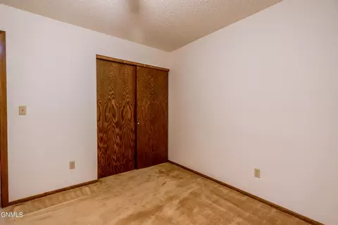 Bedroom - 467 E Brandon Dr, Bismarck, ND 58503 photo 7 of 8