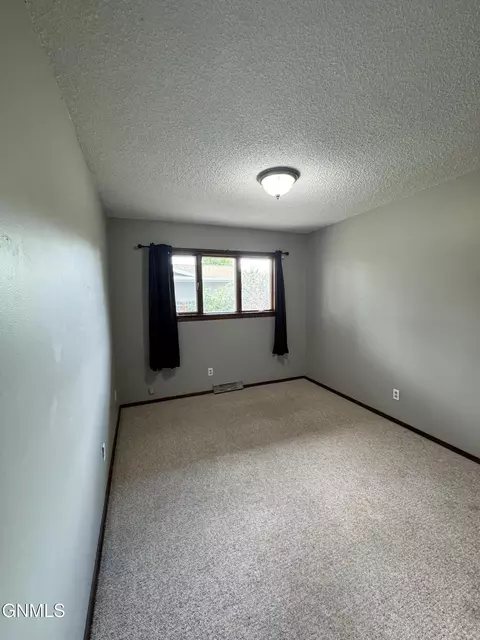 Bedroom - 820 9th Ave SW, Sidney, MT 59270 photo 1 of 4