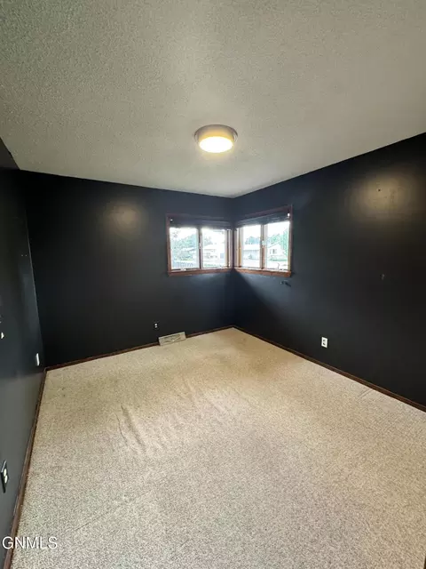 Bedroom - 820 9th Ave SW, Sidney, MT 59270 photo 3 of 4