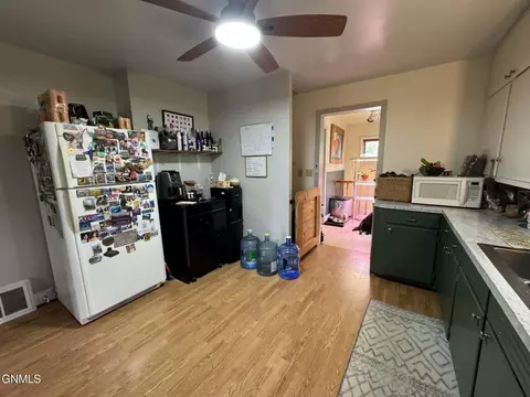 Kitchen - 111 Roosevelt Ave NE, Bowbells, ND 58721 photo 3 of 3