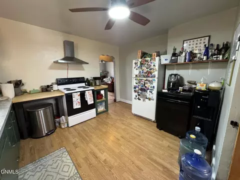 Kitchen - 111 Roosevelt Ave NE, Bowbells, ND 58721 photo 2 of 3