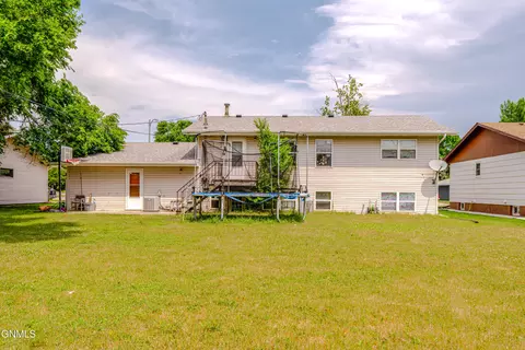 Exterior - 303 Interstate Ave, Bismarck, ND 58503 photo 5 of 7