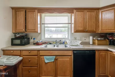 Kitchen - 303 Interstate Ave, Bismarck, ND 58503 photo 2 of 6