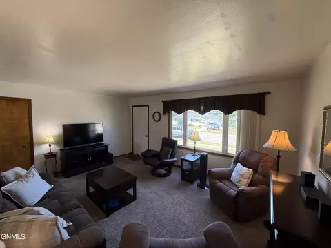 Living - 1839 Ryan Dr, Bismarck, ND 58501 photo 2 of 2