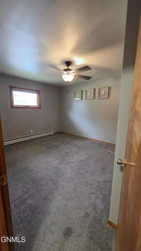 Bedroom - 102 Robinson St, Grenora, ND 58845 photo 1 of 4