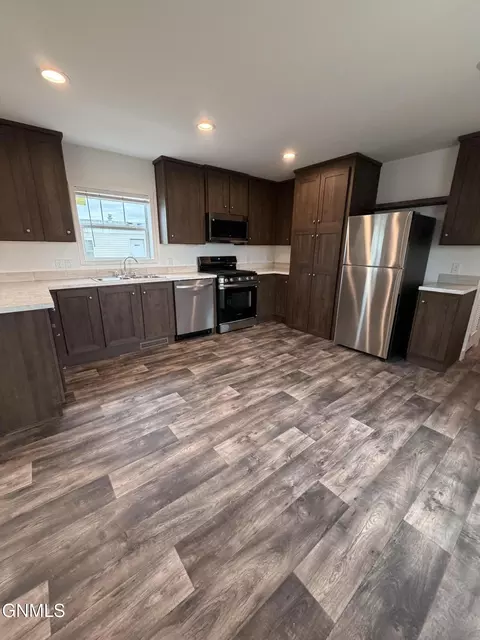 Kitchen - 228 D St, Dickinson, ND 58601 photo 1 of 6