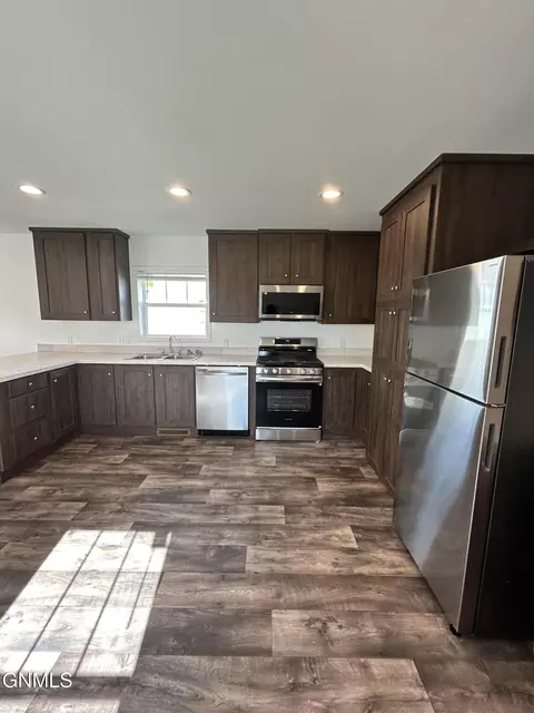 Kitchen - 228 D St, Dickinson, ND 58601 photo 4 of 6