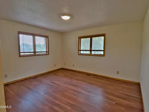 Bedroom - 24 6th Ave W, Ray, ND 58849 photo 2 of 6