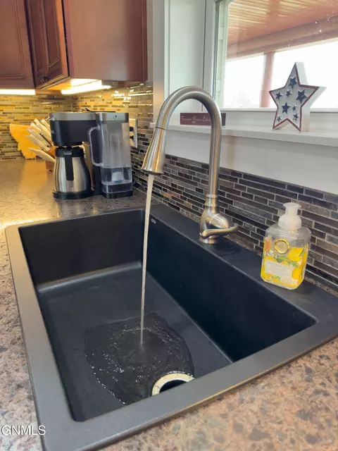 Kitchen - 14718 Lambert St, Williston, ND 58801 photo 5 of 7