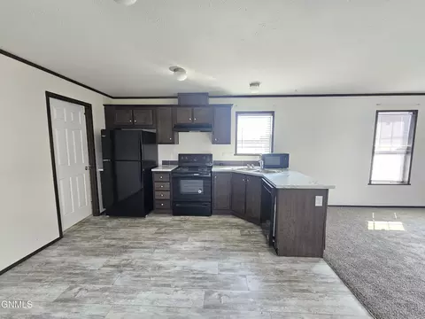 Kitchen - 714 27th St W, Williston, ND 58801 photo 2 of 3