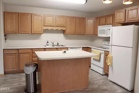 Kitchen - 131 3rd Ave SE, Mandan, ND 58554 photo 6 of 8