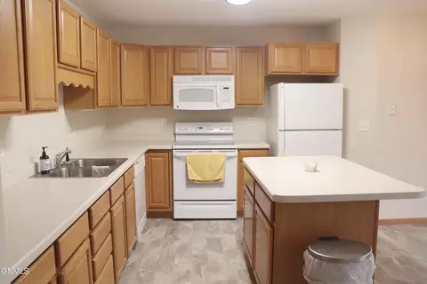 Kitchen - 131 3rd Ave SE, Mandan, ND 58554 photo 3 of 8