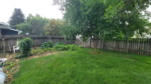 Exterior - 103 Redstone Dr, Bismarck, ND 58503 photo 10 of 24