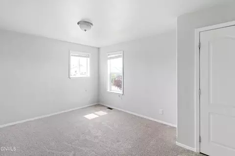 Bedroom - 801 40th St E, Williston, ND 58801 photo 3 of 4