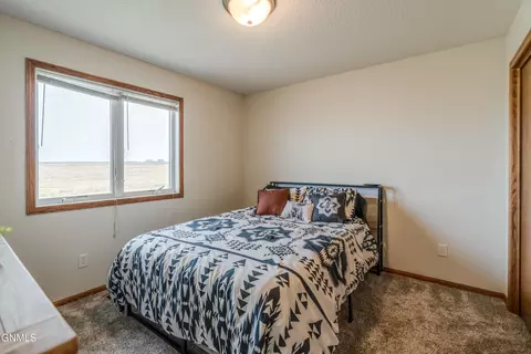 Bedroom - 6260 28th Ave SE, Lincoln, ND 58504 photo 3 of 7