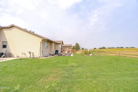 Exterior - 6260 28th Ave SE, Lincoln, ND 58504 photo 3 of 12
