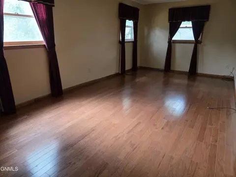 Living - 1077 4th Ave E, Dickinson, ND 58601 photo 6 of 7