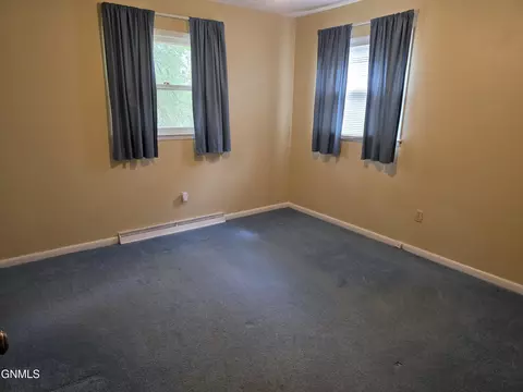 Bedroom - 1077 4th Ave E, Dickinson, ND 58601 photo 2 of 3