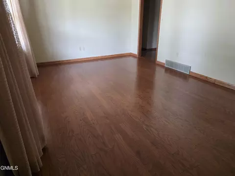 Living - 1077 4th Ave E, Dickinson, ND 58601 photo 1 of 7