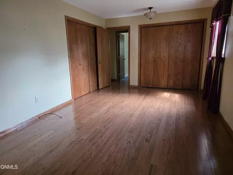 Bedroom - 1077 4th Ave E, Dickinson, ND 58601 photo 3 of 3