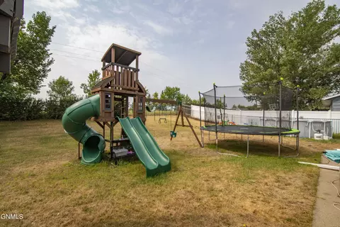 Exterior - 65 Custer Dr, Lincoln, ND 58504 photo 4 of 9