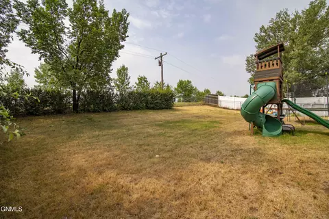 Exterior - 65 Custer Dr, Lincoln, ND 58504 photo 5 of 9
