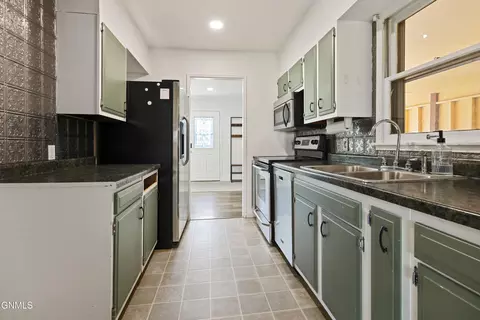 Kitchen - 903 13th Ave W, Williston, ND 58801 photo 3 of 3