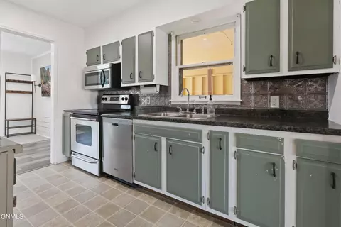 Kitchen - 903 13th Ave W, Williston, ND 58801 photo 2 of 3