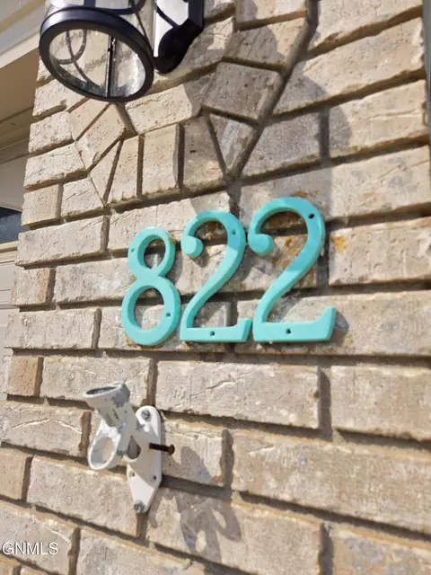 Exterior - 822 Interstate Ave W, Bismarck, ND 58503 photo 4 of 11