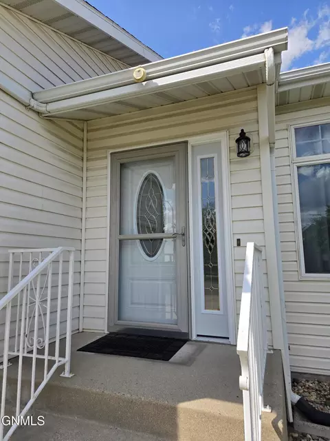 Exterior - 822 Interstate Ave W, Bismarck, ND 58503 photo 2 of 11