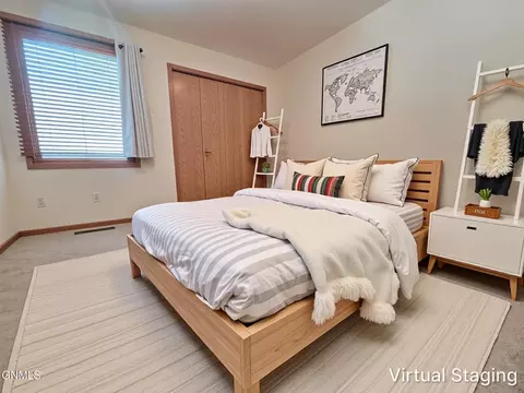 Bedroom - 822 Interstate Ave W, Bismarck, ND 58503 photo 3 of 8