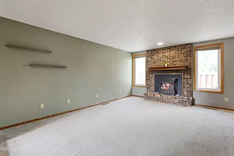 Living - 611 11th St E, Williston, ND 58801 photo 2 of 4