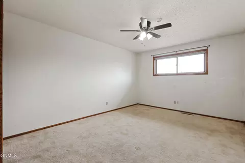Bedroom - 611 11th St E, Williston, ND 58801 photo 2 of 3