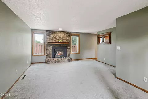 Living - 611 11th St E, Williston, ND 58801 photo 1 of 4