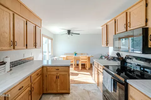 Kitchen - 810 3rd Ave NE, Mandan, ND 58554 photo 4 of 8