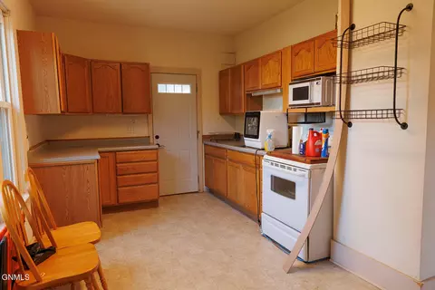 Kitchen - 236 4th St W, Dickinson, ND 58601 photo 1 of 2