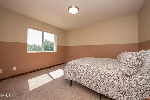 Bedroom - 711 28th St W, Dickinson, ND 58601 photo 8 of 8