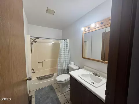 Bath - 111 4th Ave SE, Elgin, ND 58533 photo 1 of 3