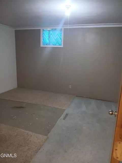 Bedroom - 111 4th Ave SE, Elgin, ND 58533 photo 5 of 6