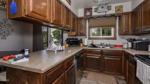 Kitchen - 709 3rd Ave SE, Mandan, ND 58554 photo 3 of 5
