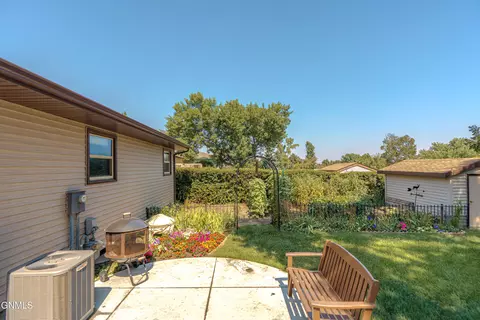 Exterior - 806 Johns Dr NE, Mandan, ND 58554 photo 8 of 14
