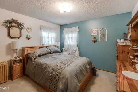 Bedroom - 806 Johns Dr NE, Mandan, ND 58554 photo 1 of 3